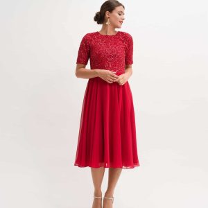 Vestido corto pedrería vuelo