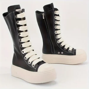 Bottes montantes noires à lacets blancs, style basket, semelle plateforme