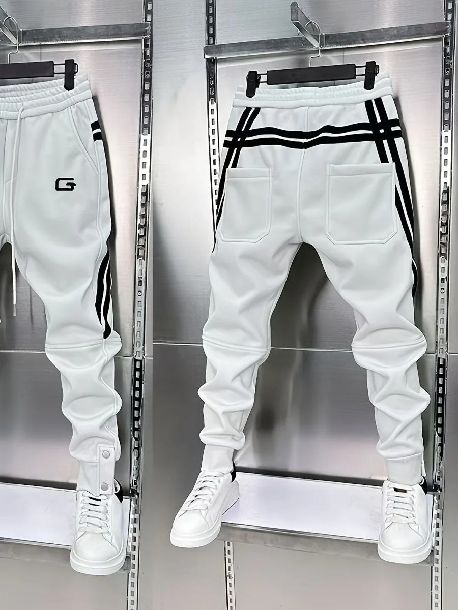 Pantalon de jogging homme avec cordon de serrage, rayures latérales et boutons pression, coupe fuselée - Imagen 5