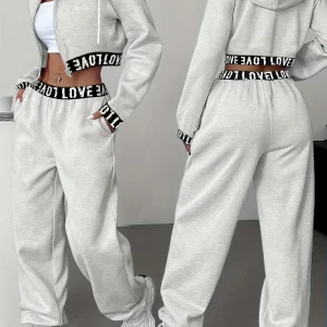 Ensemble survêtement femme crop top à capuche et pantalon large couleur unie