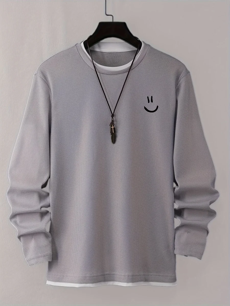 Pull homme texturé gaufré manches longues imprimé smiley col rond