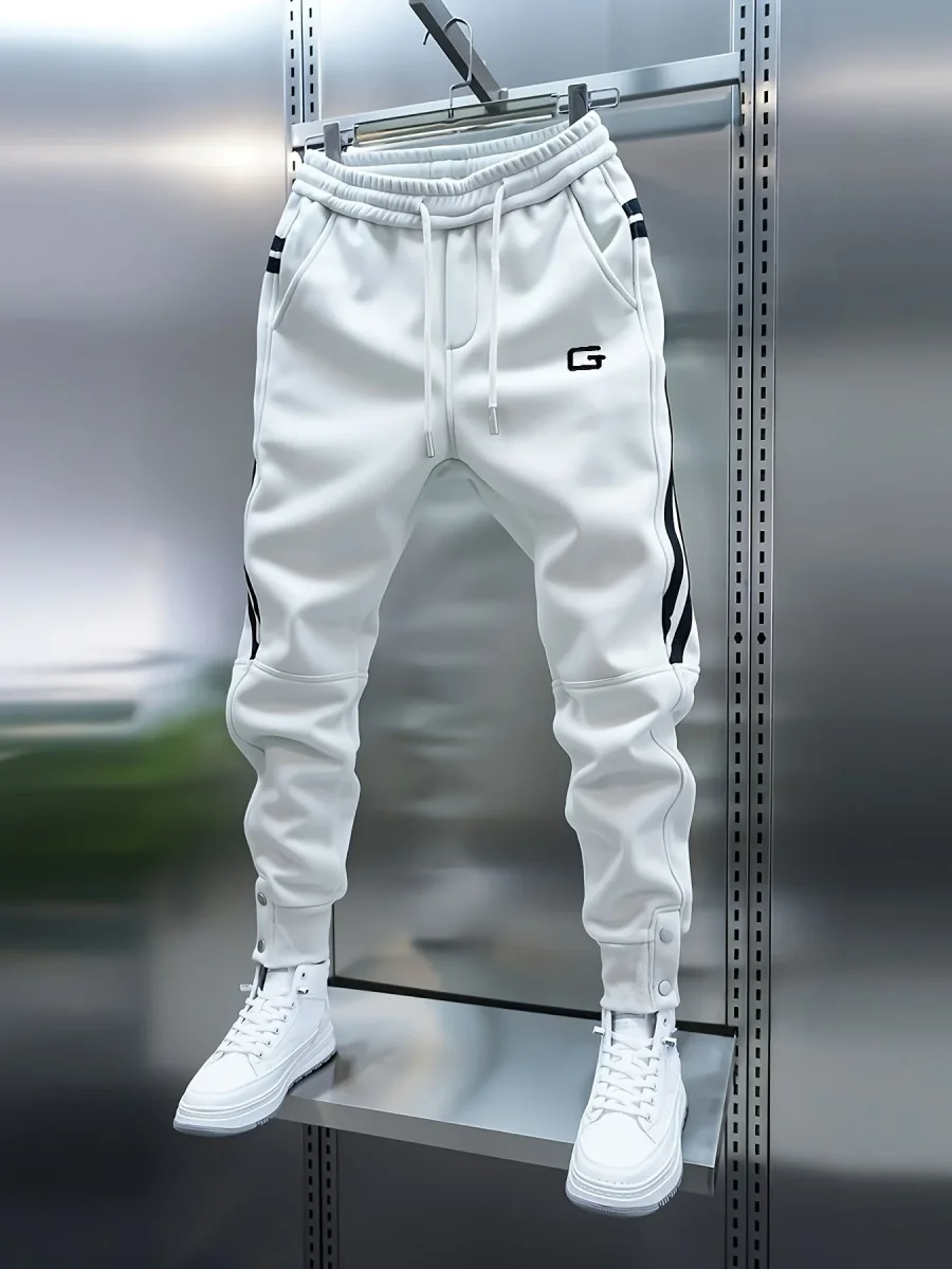 Pantalon de jogging homme avec cordon de serrage, rayures latérales et boutons pression, coupe fuselée - Imagen 3