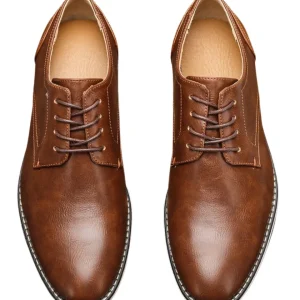 Zapatos elegantes de piel